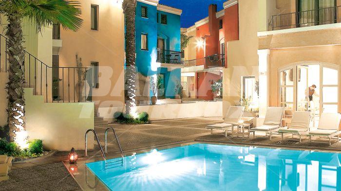 holiday in Grecotel Plaza Spa Apartments