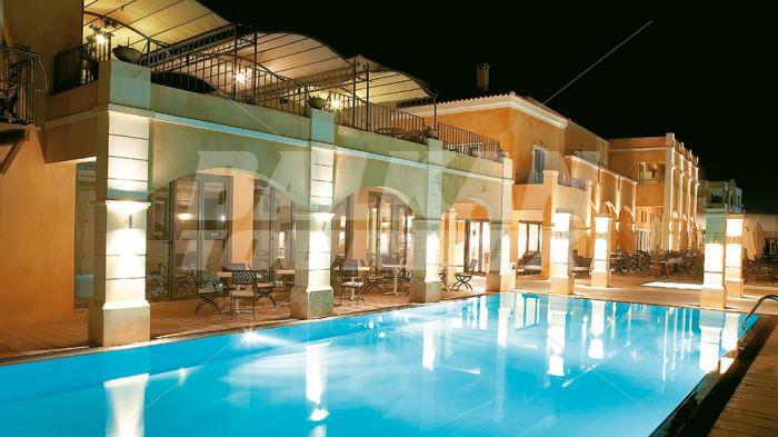 holiday in Grecotel Plaza Spa Apartments