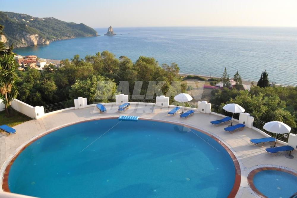 почивка в Studio apartments Maria with pool in Agios Gordios Beach